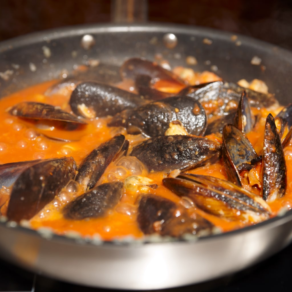 Mejillones con salsa de cerveza roja Mejillones con salsa de cerveza roja